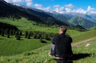 Beginner hiking trail near Almaty with Tian Shan mountains, Kok Zhailau plateau and Big Almaty Lake in Ile-Alatau National Park