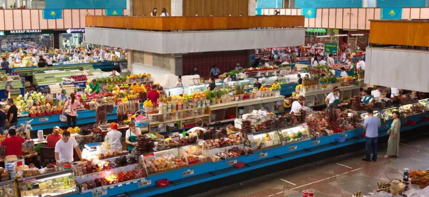 Green Bazaar Almaty main pavilion with colorful produce displays and vendors