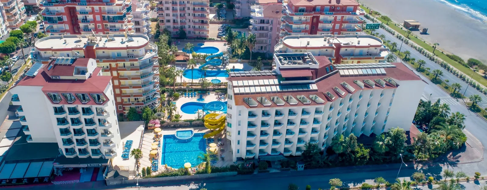 Sun Star Beach в Махмутларе — пляж и корпус отеля