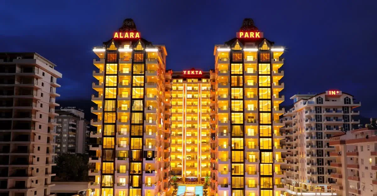 Yekta Alara Park Residence в Махмутларе — башни вечером